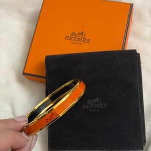 Hermes bracelet in orange. Hermès Caleche Enamel B
